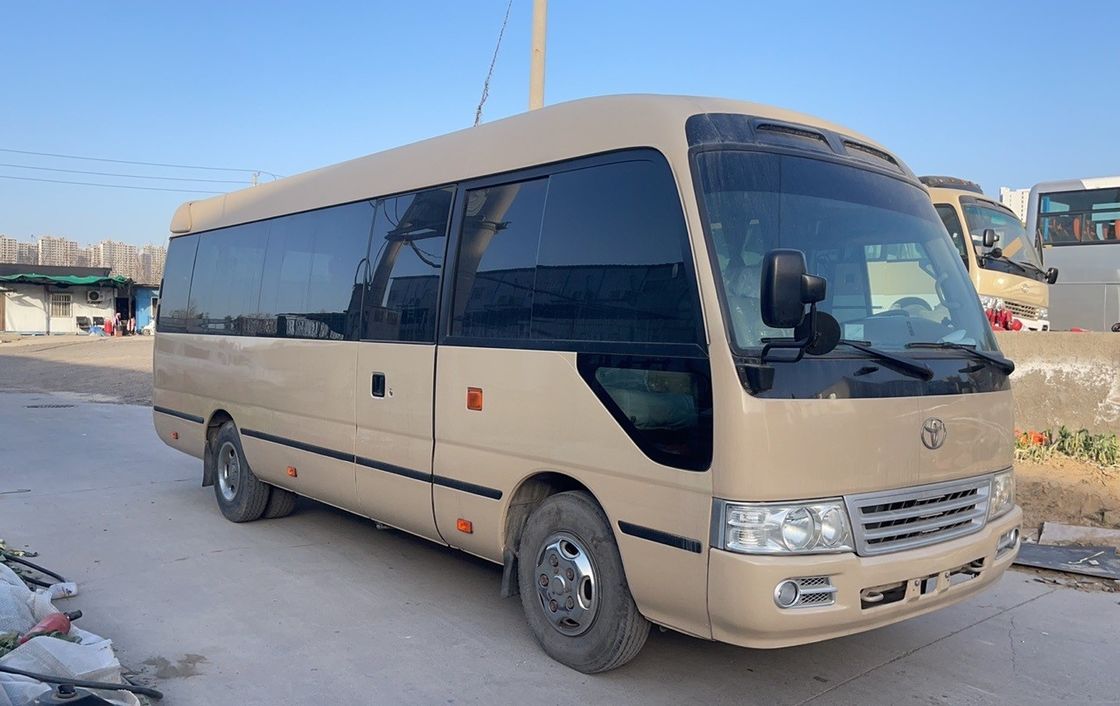 Ônibus de luxo de 30 lugares Toyo Ta Coaster com potência máxima de 113/5200kw e emissões EURO 3