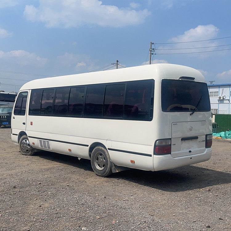 Autocarro Toyota Coaster de direção esquerda 26 lugares e 30 lugares Minibus com capacidade de motor 4L