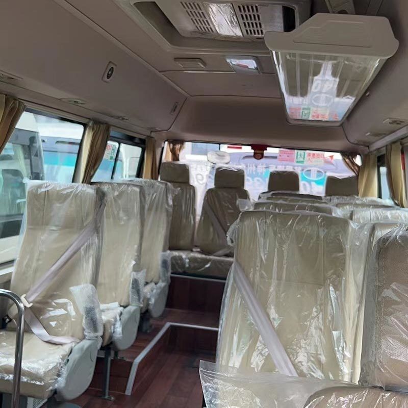 Velocidade máxima 100 km/h Toyota Coaster Bus 20-23 lugares com motor de gasolina de segunda mão