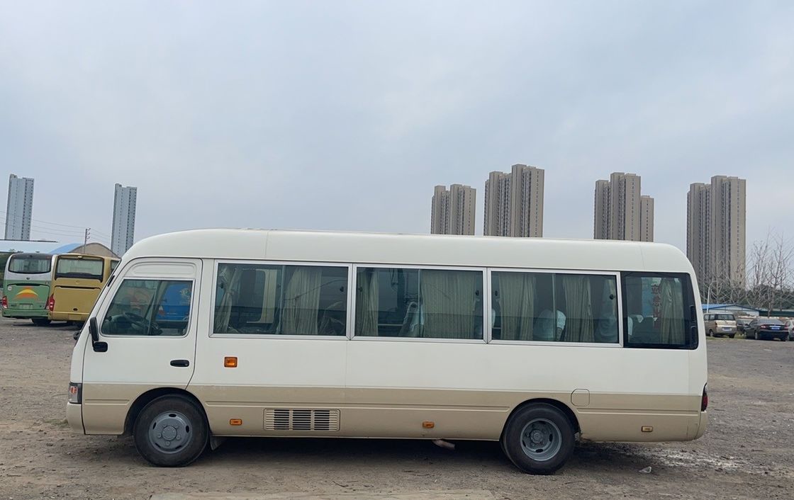 11Ônibus turístico de luxo de 30 lugares ônibus usado diesel Toyota Coaster para turismo