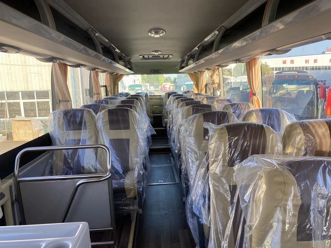 Confortável autocarro de ônibus de 65 lugares com capacidade de motor de 6 8L e suspensão de mola de folha