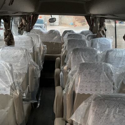 Autocarro Toyota Coaster de direção esquerda usado com ar condicionado opcional