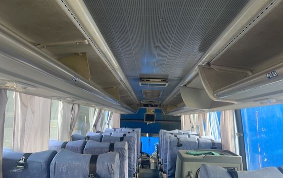 Ônibus de turismo de luxo de passageiros com direção LHD e interior espaçoso